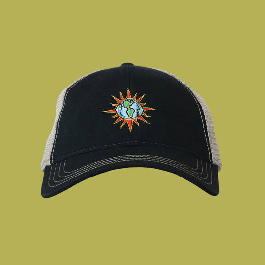 Black and beige cap with a sun and globe design on a white background