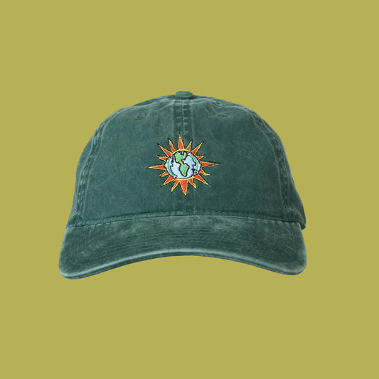 Green cap wit dolphin and earth artwork on front
